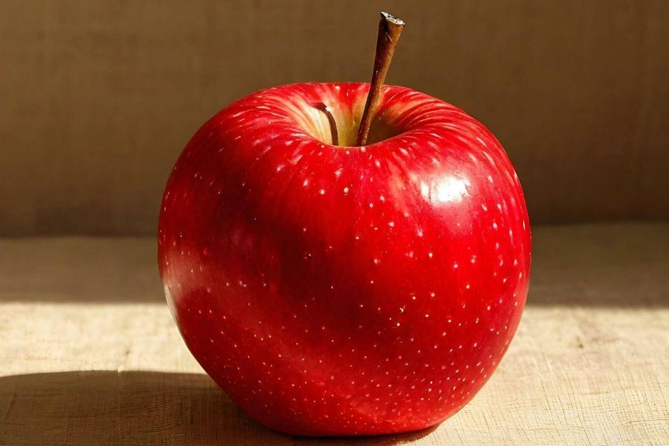 Original photo: a red apple on a burlap background